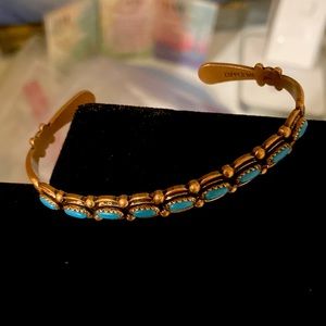 Copper bracelet with faux turquoise stones from D&B Supply.